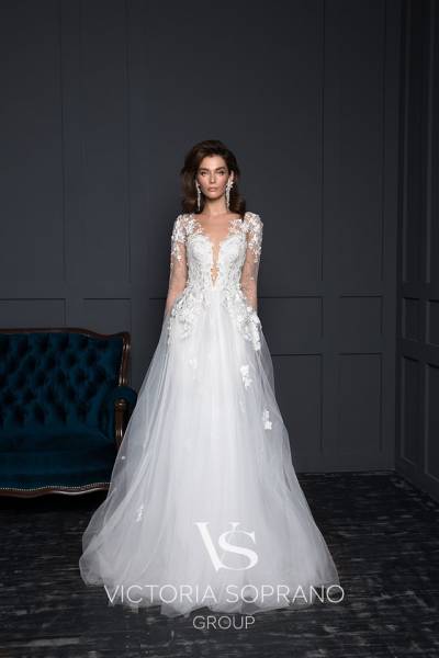 robe blanche avec manche de mariée à Marseille 13001